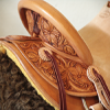 a working wade saddle, 3/8ths tooled with a classic medium Sheridan style flower.